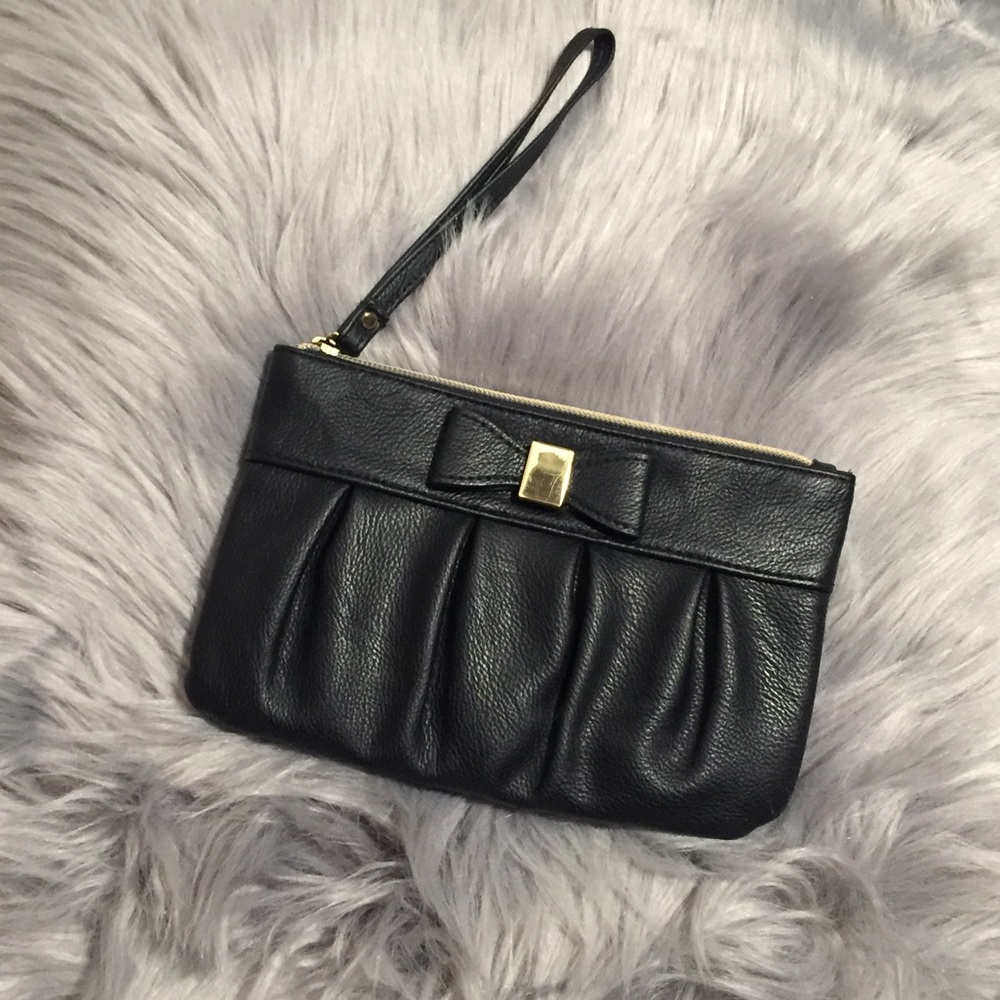 New black faux leather wristlet!